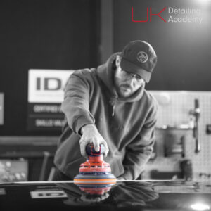 Wet sanding car paintwork with an orbital sanding machine