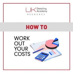 Calculator, chart and paperwork for working out fixed costs in a detailing business